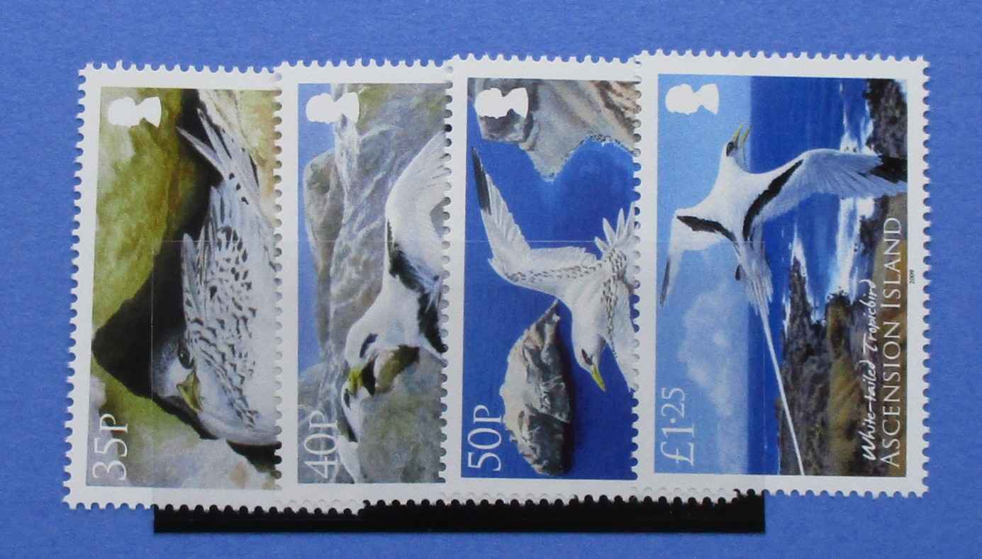 Four postage stamps featuring birds on a blue background, with denominations 35p, 40p, 50p, and £125 visible on the left side.