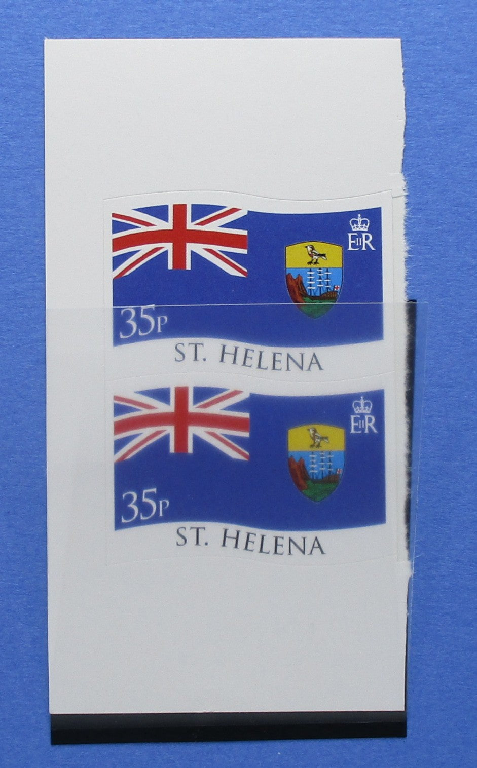 A sheet of two St. Helena postage stamps, each showing the St. Helena Island Flag