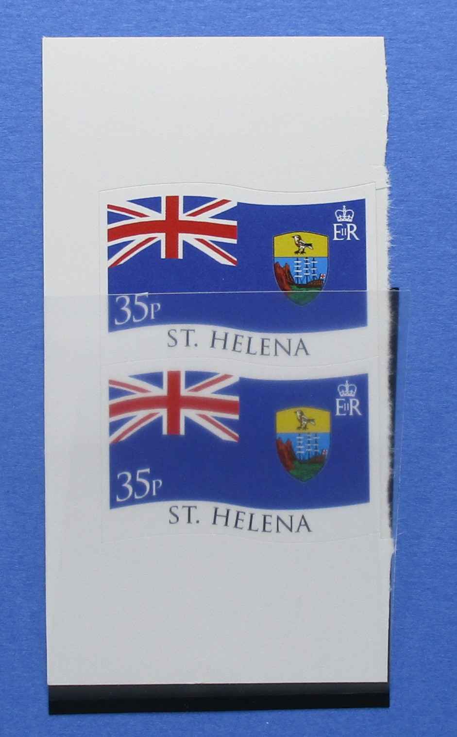 A sheet of two St. Helena postage stamps, each showing the St. Helena Island Flag