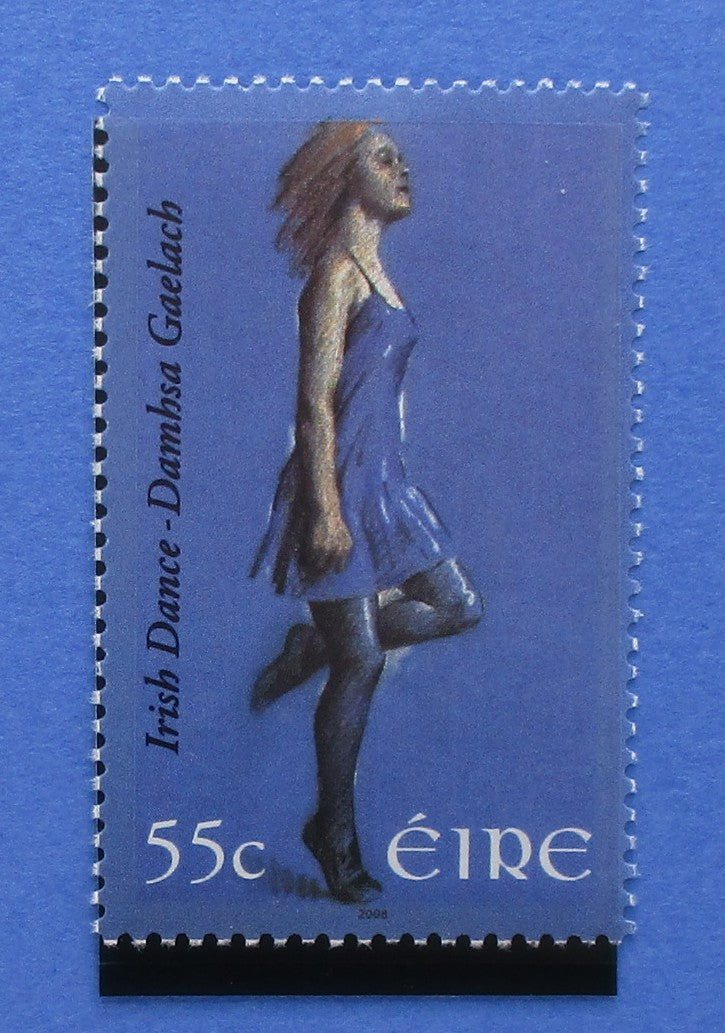 Stylized postage stamp of a woman in a blue dress with 'Irish Dance' text on a blue background