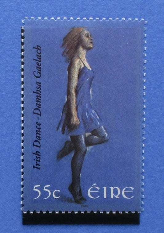 Stylized postage stamp of a woman in a blue dress with 'Irish Dance' text on a blue background