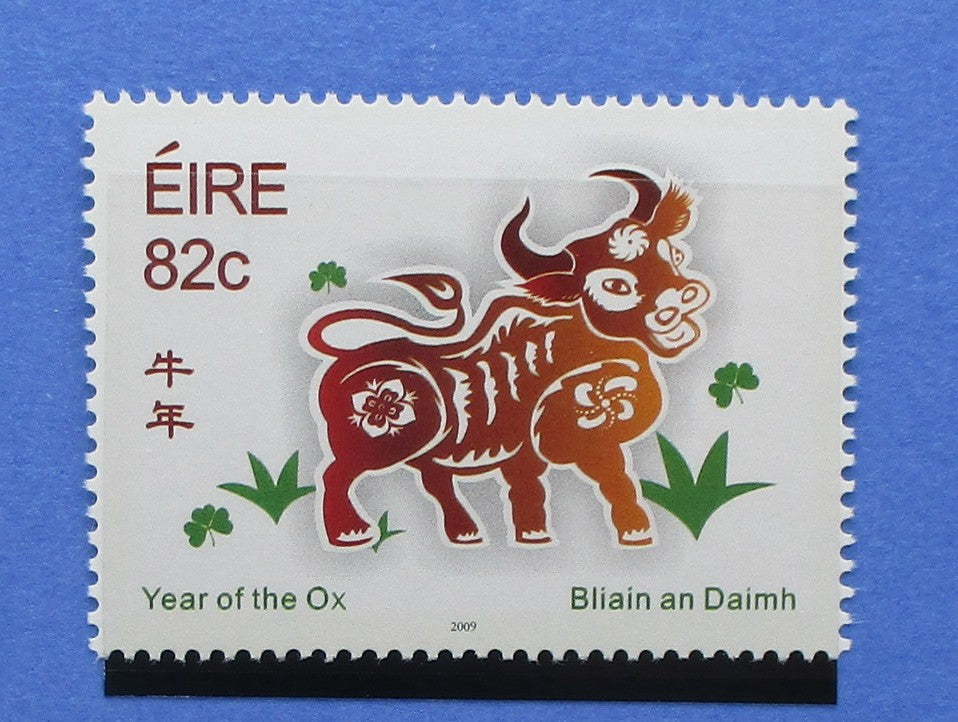 Stamps featuring a bull design with text and symbols on a blue background