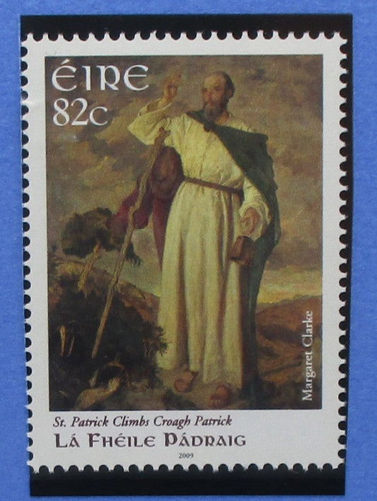 St. Patrick Climb Crogh Patrick stamp with a depiction of a man in a white robe on a blue background