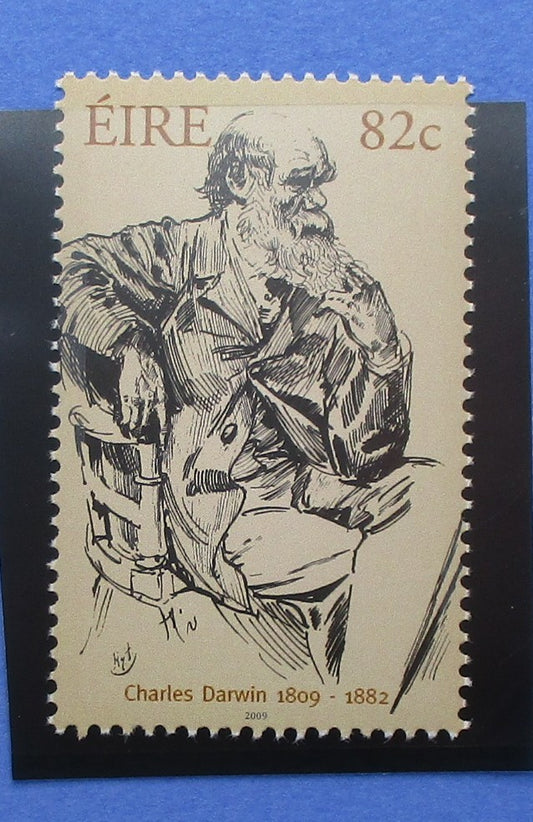 Stamp featuring a black and white illustration of Charles Darwin with text 'ÉIRE 82c' and 'Charles Darwin 1809-1882'.